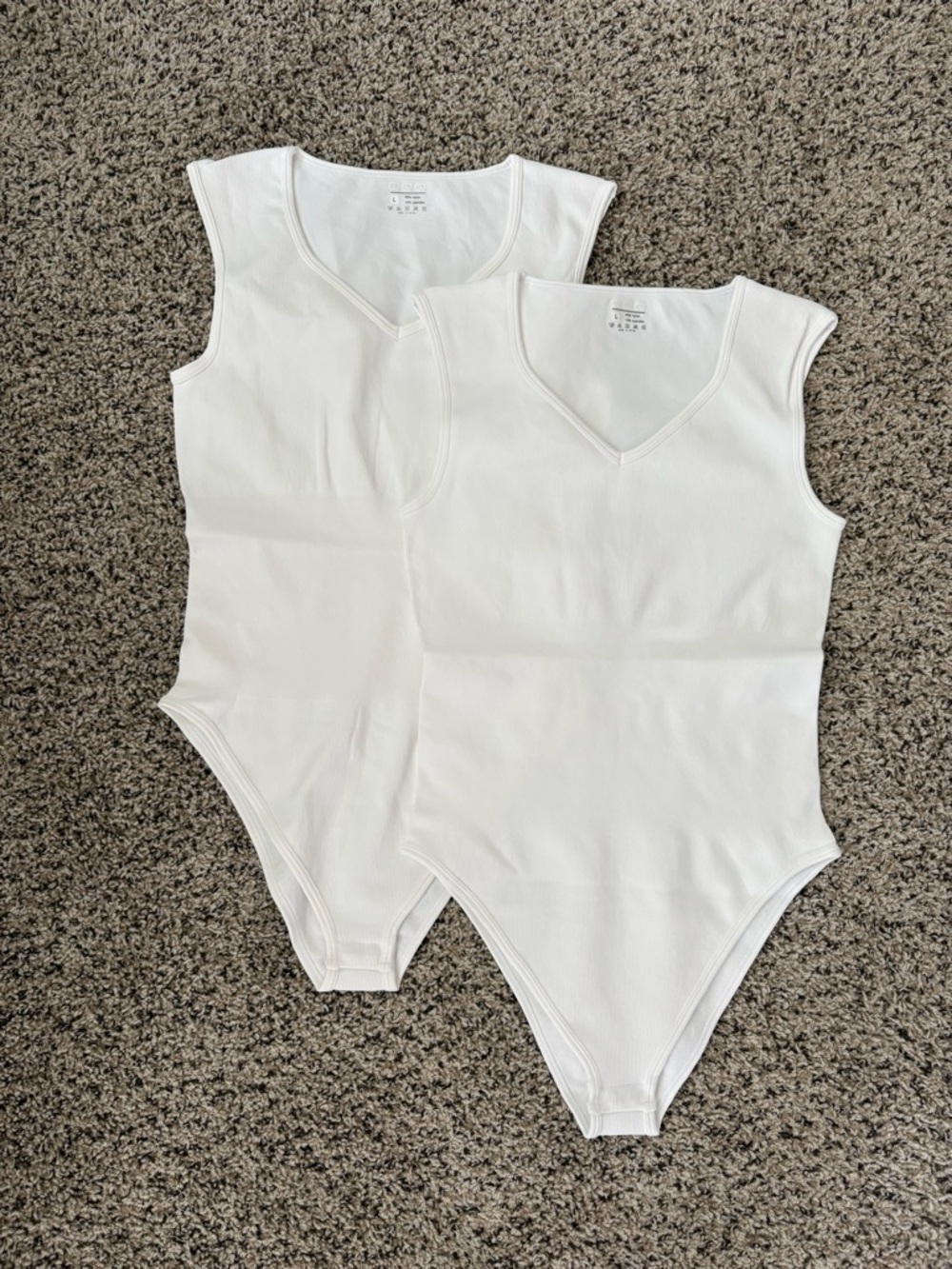 2 Soft Ribbed White V‑Neck One‑Piece Bodysuits